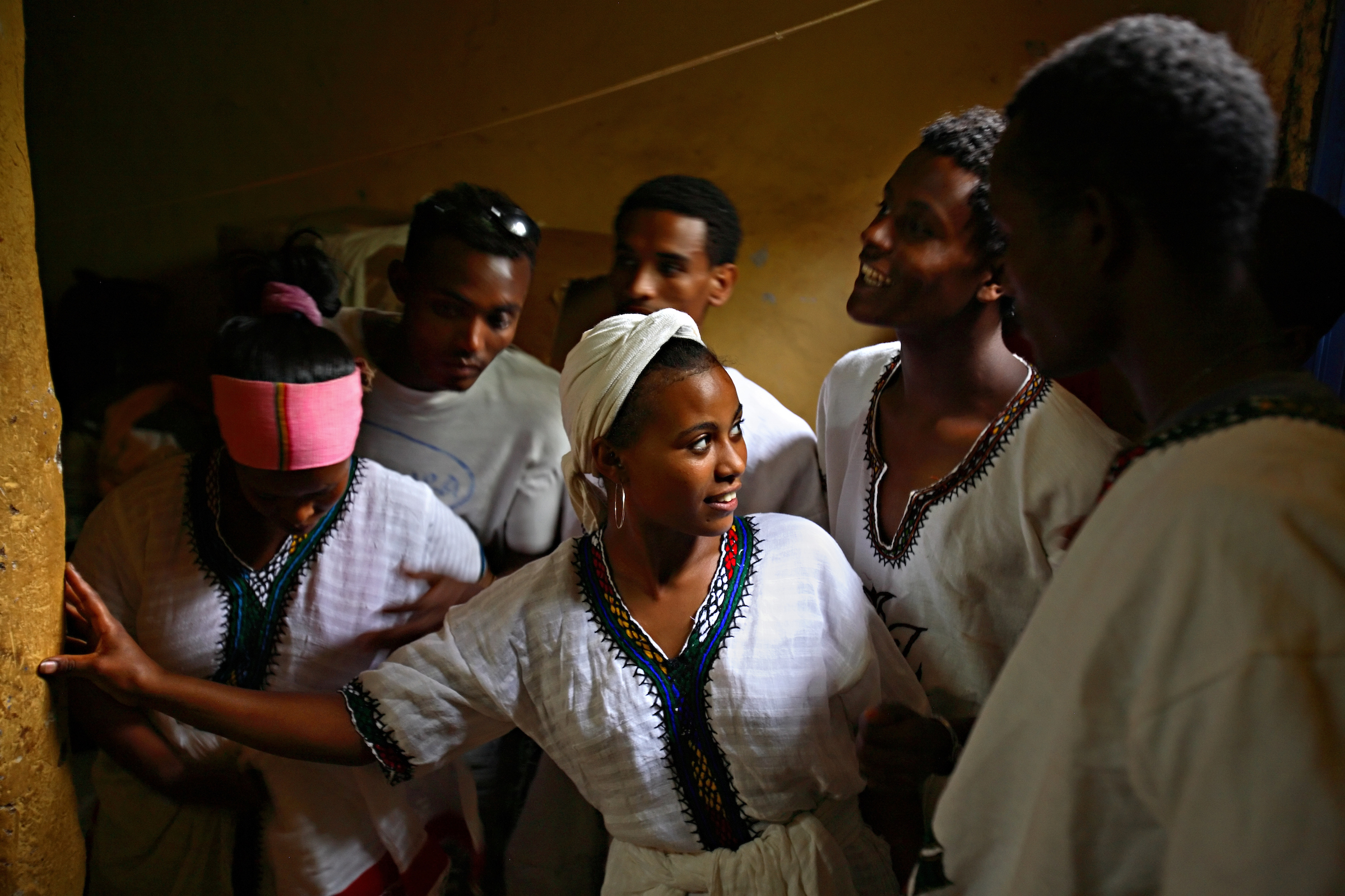 Members of the Fistula Girls Club and the Community-based Reproductive Association,  perform a traditional dance against child marriage in Shende, Ethiopia